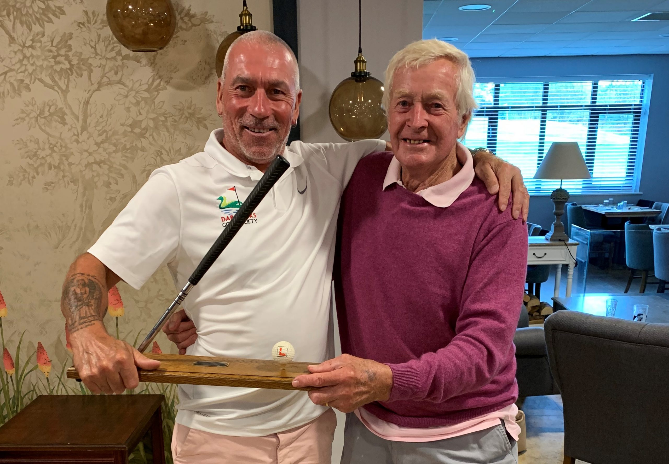 Pete Keen & Donald Barnes enjoy the wrestle for 'winning' the Buried Head Trophy!